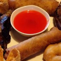 Pu Pu Platter (For 2) · Crab rangoon, fried shrimp, spare ribs, chicken nuggets, spring roll, chicken wings, and cra...