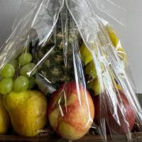Fruit Basket · Fruit gift baskets containing apples, oranges, pineapples, grapes and more, make a great hea...
