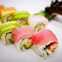 Rainbow Roll · 8 pieces. Raw. California with a variety of fish and avocado.