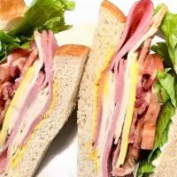 New Club Sandwich · Roast beef, honey ham, applewood bacon, american and swiss cheese, mustard and mayo on your ...