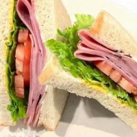 Honey Ham Sandwich · Honey ham with lettuce, tomato, mustard, and mayo on your choice of bread.