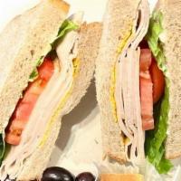 Smoked Turkey Sandwich · Mesquite smoked turkey with lettuce, tomato, mustard, and mayo..on your choice of bread