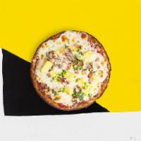 Strange Love (Hawaiian) · Crispy cauliflower pizza crust topped with red sauce, ham, pineapples, and mozzarella cheese.