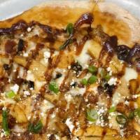 Bbq Chicken & Goat Cheese Pizza (Large) · Chipotle BBQ sauce topped with chicken, green onion and Goat cheese.