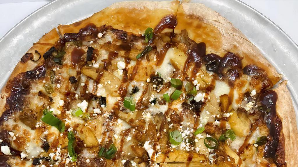 Bbq Chicken & Goat Cheese Pizza (Large) · Chipotle BBQ sauce topped with chicken, green onion and Goat cheese.
