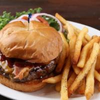 The American Burger · Our fresh 8oz Angus beef patty char-grilled and topped with American cheese, lettuce, tomato...