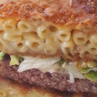 Mac & Cheese Burger · Our fresh 8oz Angus beef patty, topped with our homemade gooey mac and cheese, lettuce, toma...
