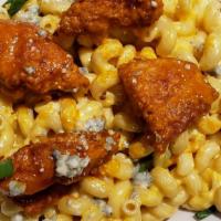 Buffalo Mac & Cheese · Heaping portion of our gooey mac and cheese topped with a tender chicken breast lightly brea...