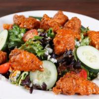 Buffalo Chicken Salad · Anchor Bar Signature Items. Crispy or grilled chicken strips tossed with Original (Medium) A...