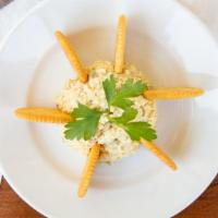 Eggless Bowl · Baked organic tofu salad served chilled with crackers.