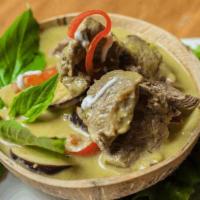 Green Curry  · Lightly spicy and tasty curry, bell pepper,
bamboo shoot and eggplant.