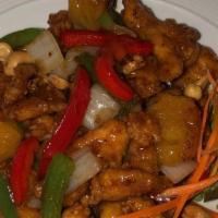 Cashew Prik Pao · Chef special sweet Thai chili paste sauce sauteed
with light battered choice of protein, bel...
