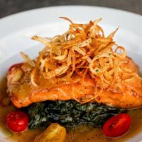 Salmon Luciano · Pan Seared Salmon, Lemon, White Wine Sauce, Spinach.