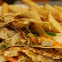 Chicken Quesadilla · Grilled chicken breast with peppers, onions, and cheddar cheese served is a grilled tortilla...