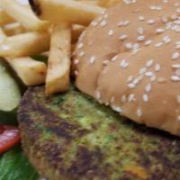 Veggie Burger · Grilled vegan veggie burger patty. Served on a bun with lettuce, tomato, & fries.