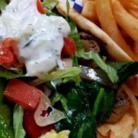 Veggie Gyro · Greek style seasoned and grilled peppers, onions, spinach, and mushrooms wrapped in a pita w...