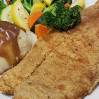 Fried Grouper Dinner · Served with mashed potatoes and mixed vegetables.