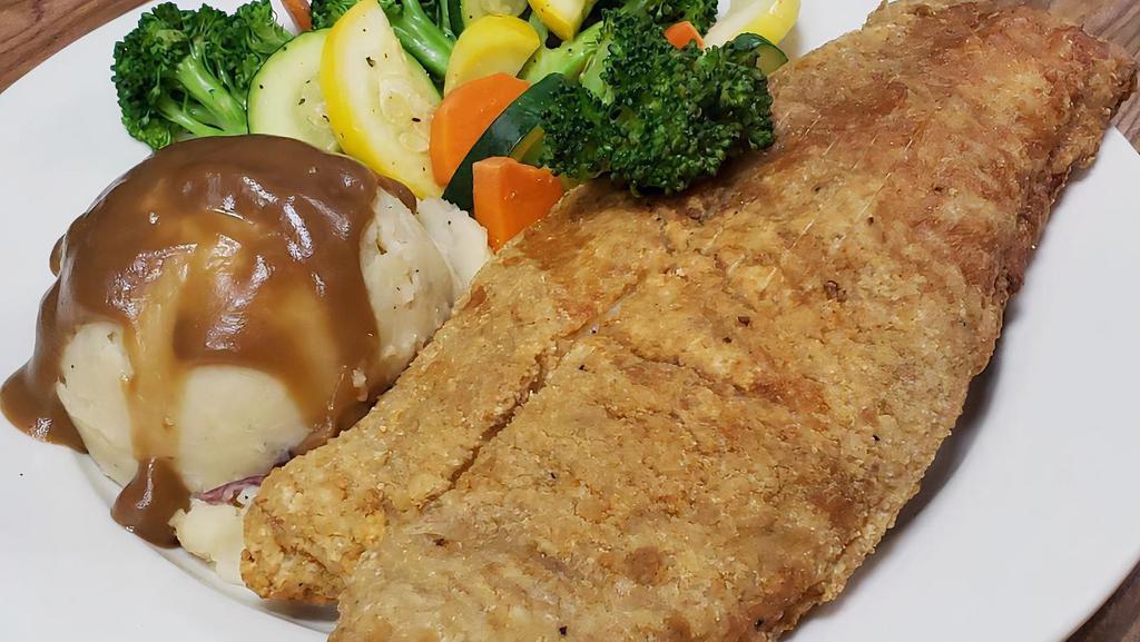Fried Grouper Dinner · Served with mashed potatoes and mixed vegetables.