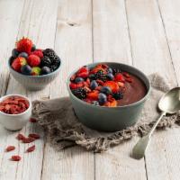 Berries & Greek Yogurt · Acai blended with mixed berries, honey and greek yogurt. Topped with sliced strawberries, ra...