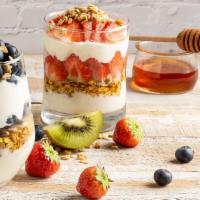 Strawberry Parfait · Layered greek yogurt, strawberries, granola and honey. Cal. 210.