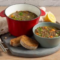 Hearty Lentil Soup · Vegetarian and hearty version of the classic lentil soup, served with a side of bread.