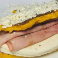Ham & Cheese Cachapa · Traditional Venezuelan sweet corn meal pancake with soft white cheese and ham