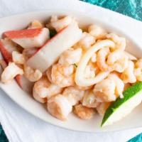 Seafood Delight · Served with steamed white rice. A mixture of fresh shrimp, crab stick, calamari and mixture ...
