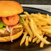 Vegan Burger · Vegan pattie, mixed green, vegan cheese, red onion, tomatoes, special sauce.