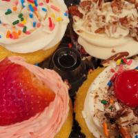 Box Of 4 Cupcakes · A box of 4 fresh baked cupcakes. Check the box next to each cupcake flavor you desire. Flavo...