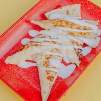 Kids Quesadilla · Toasted wheat tortilla filled with Chihuahua and Queso Fresco Cheese ...served with Sour Cream