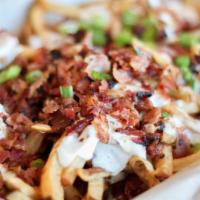 Pub Grub · Fresh cut chips or fries topped with homemade beer cheese, chopped bacon and garnished with ...
