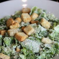 Caesar Salad · Chopped romaine lettuce tossed with parmesan cheese, croutons and
homemade Caesar dressing.