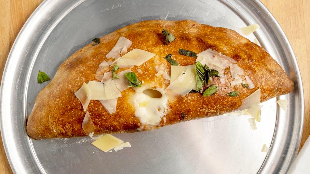 Calzone · Our house pizza sauce and mozzarella cheese stuffed in a golden pizza crust.