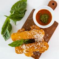 Mozzarella Sticks · Homemade Golden crispy mozzarella sticks served with our pomodoro & pesto sauce.