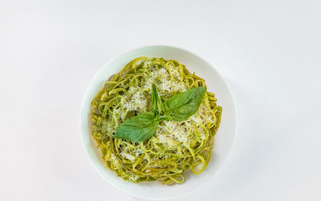 Simple Linguini Pesto · Homemade creamy pesto sauce, mixed with linguini pasta topped with parmesan cheese and basil leaf.