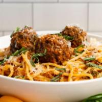 Spaghetti Bolognese With Meatballs · Spaghetti pasta with 100% beef bolognese sauce topped with three meat balls and parmesan che...