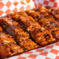 Louis Ribs · Big mama's specialty, these ribs have both the bark and the bite! Premium St. Louis full or ...