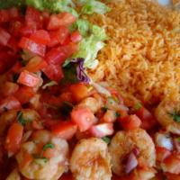 Shrimp Ala Mexicana · Fresh shrimp with serrano peppers, onions and tomatoes, served with rice and salad.