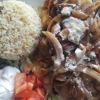 Pollo Con Crema · A Grilled Chicken breast with Grilled onions and mushrooms, topped with cream sauce. Served ...
