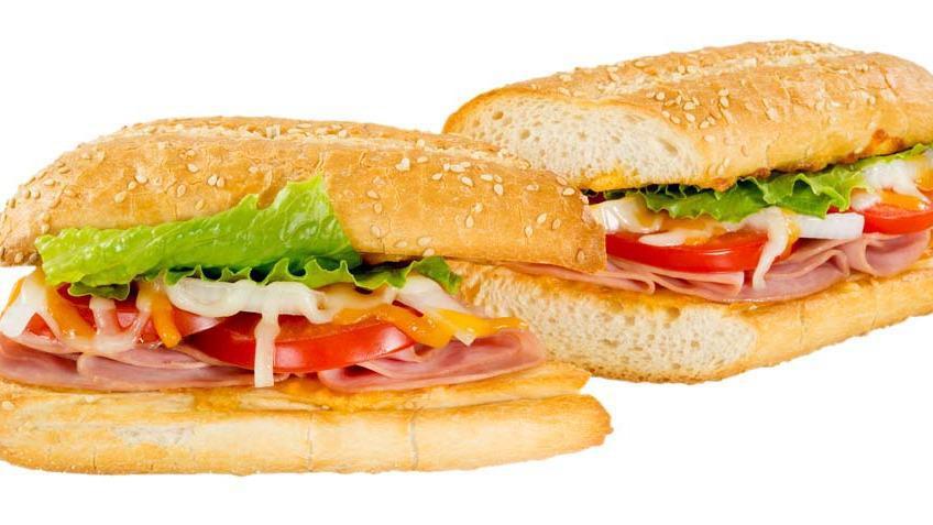 Ham & Cheese Sandwich · Canadian bacon, tomatoes, onions, and romaine lettuce topped with our signature gourmet cheese blend. Baked with your choice of sauce.