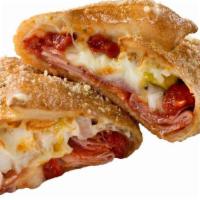 Italian · Pizza sauce, Canadian bacon, capicolla, pepperoni, onions, salami, Parmesan cheese, banana p...