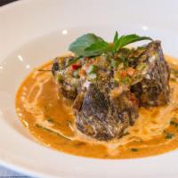 Beef Short Rib Panang · Tender braised short ribs in panang curry sauce with green bean, tri-color bell pepper, and ...
