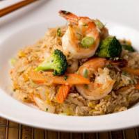 Thai Fried Rice · Jasmine rice stir fried with choice of your protein, egg, onion, broccoli, carrot.