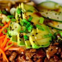 Cowboy Bibimbap · Steamed Rice, Bulgogi Beef, Pickled Cucumber & Carrot, Avocado, Sautéed Mushrooms, K-Pop Sau...
