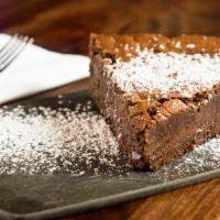 Thicc Brownie · A House-Made Extra Thick Brownie with Powdered Sugar