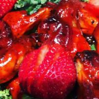 10 Krazie Caribbean Strawberry Wings · Smoked wings tossed in Caribbean Strawberry (sweet & jerk flavored) topped with fresh cut st...