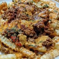 Philly Fries · Crinkle fries, vegan Philly meat, creole cheese sauce