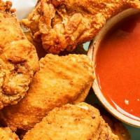 26 Pieces · The Best Wings Guaranteed
Our Wings Come Naked With Sauce On TheSide For Dipping
Our Wings A...