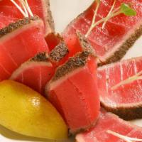 Tuna Tataki · Char broiled sliced rare tuna with ponzu sauce.