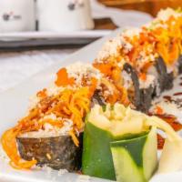 Mcdonough Roll · Deep fried salmon and cream cheese topped with baked spicy crabmeat with crunch, masago gree...